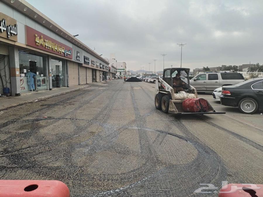 Asphalt works and car parking marking63007342449793113