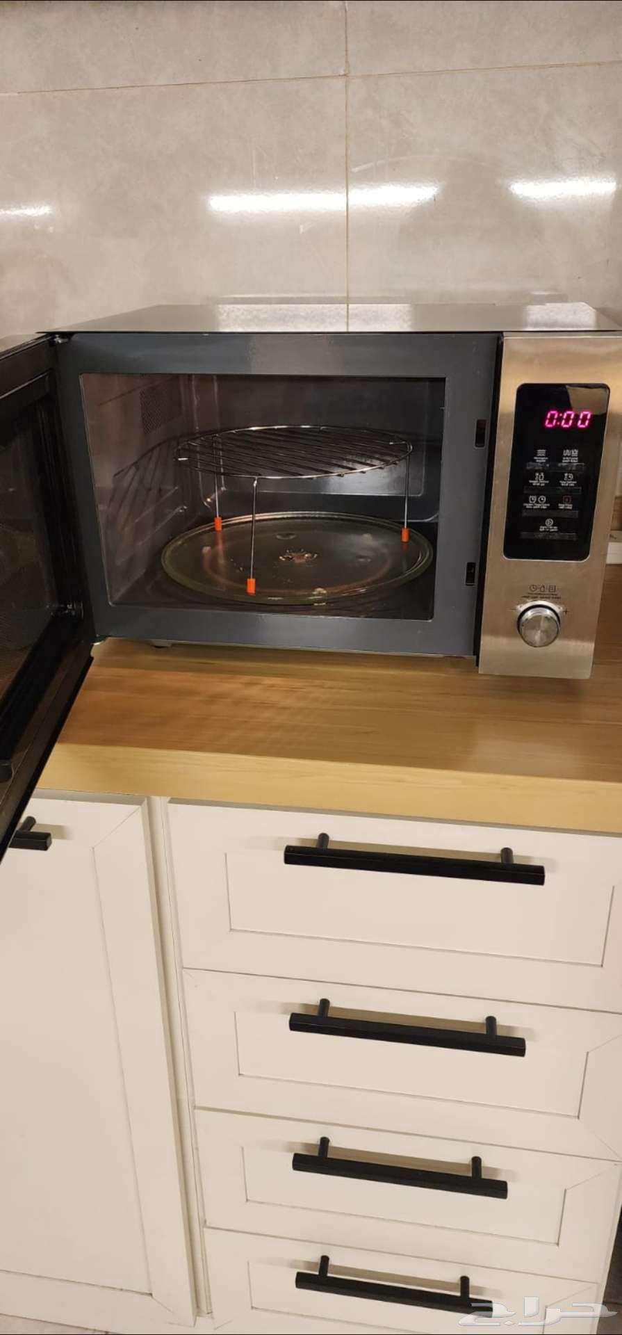 Microwave and grill, almost new63210050267779111