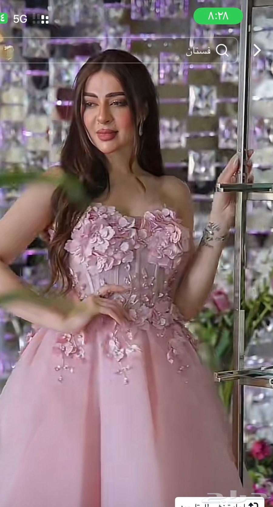 A pink dress adorned with flowers for sale63204521106307112