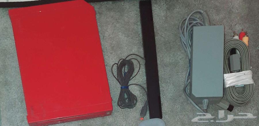 A red Wii gaming console box with a sports game partner.63177715699329114