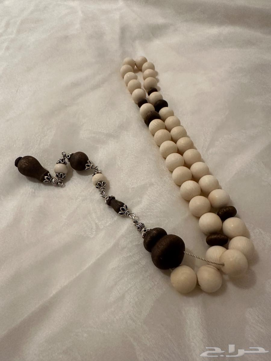 Swimming from ivory and moroccan oud wood and silver63152051655938112