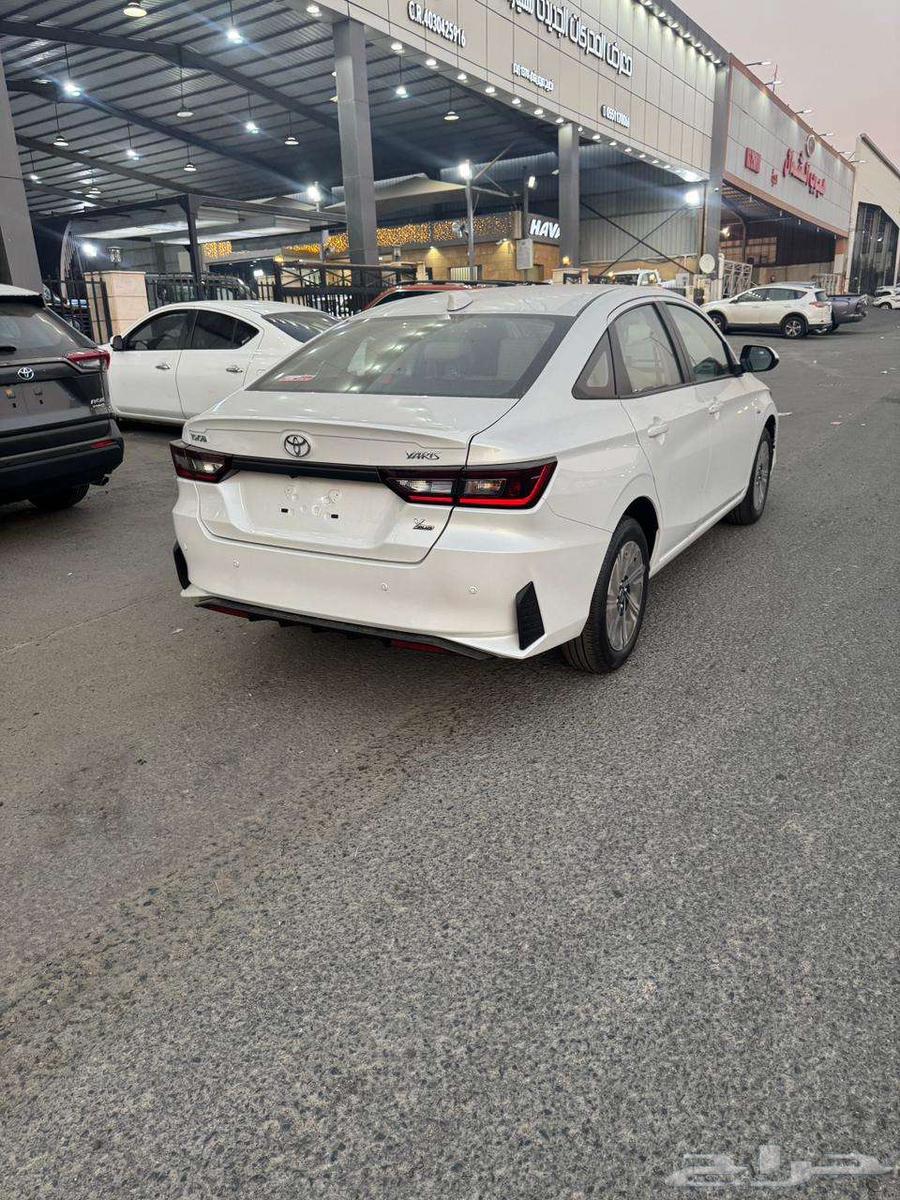 Toyota Yaris, half full, 1300 cc, white, model 202463210386936833114