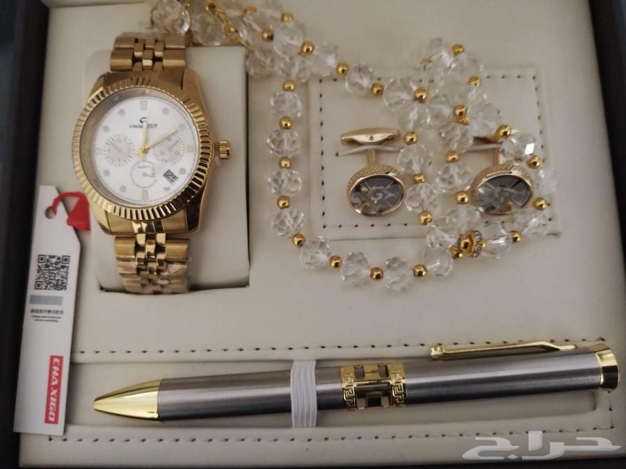 A luxury box suitable as a gift containing a rosary, a pen, a watch, and a bracelet63010245379585114
