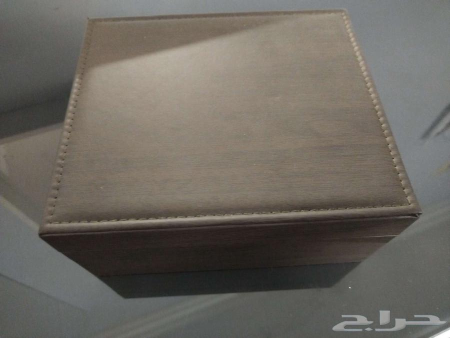 A luxury box suitable as a gift containing a rosary, a pen, a watch, and a bracelet63010245379585111