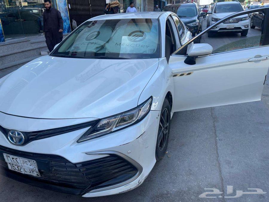 Pearl white Platinum 2023 Toyota Camry Hybrid.63137364272897114