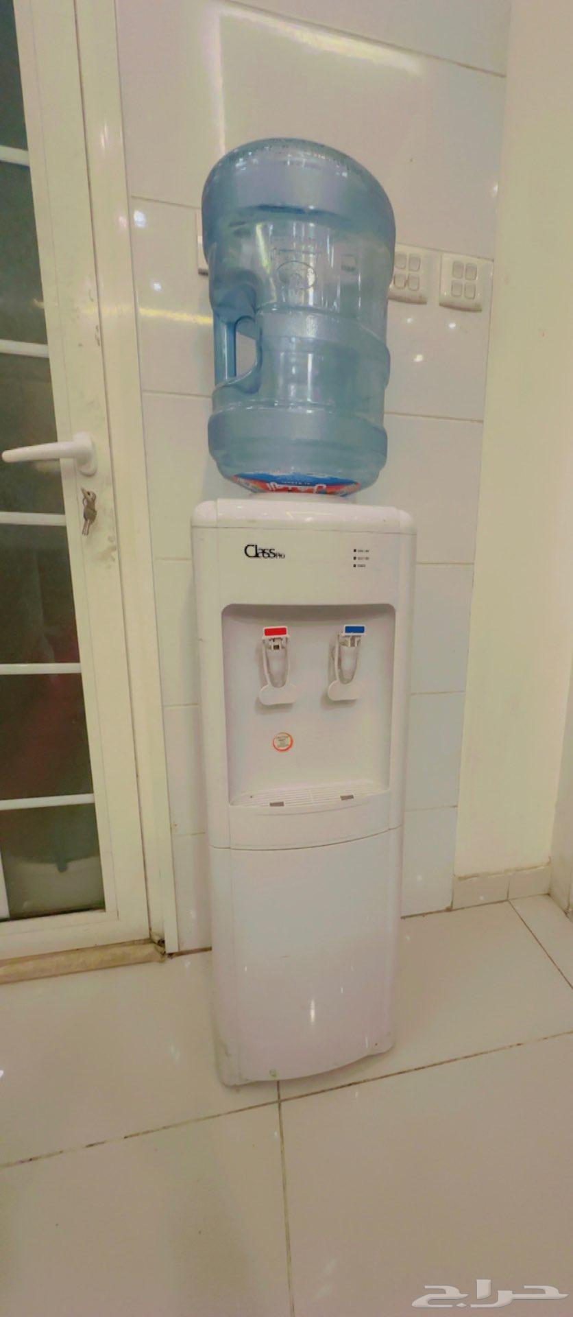 Hot and cold water dispenser with mineral water jug630814559974411128