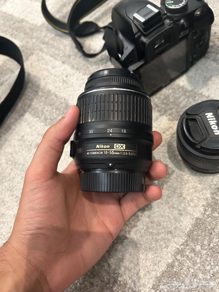 Nikon D3200 camera with three lenses63081885299329111