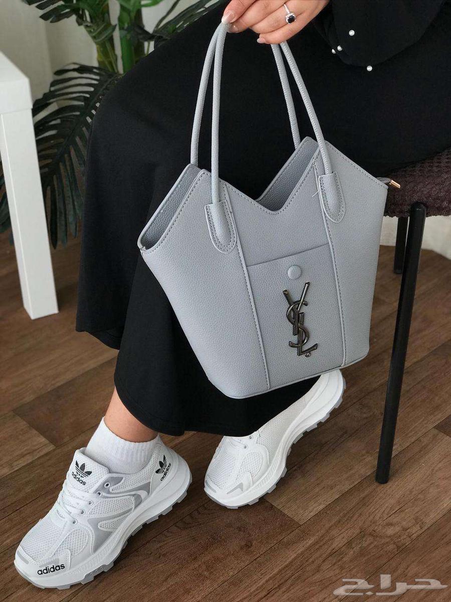 A set of a bag from the brand Cellier with several shoes from the same brand63081461016193113