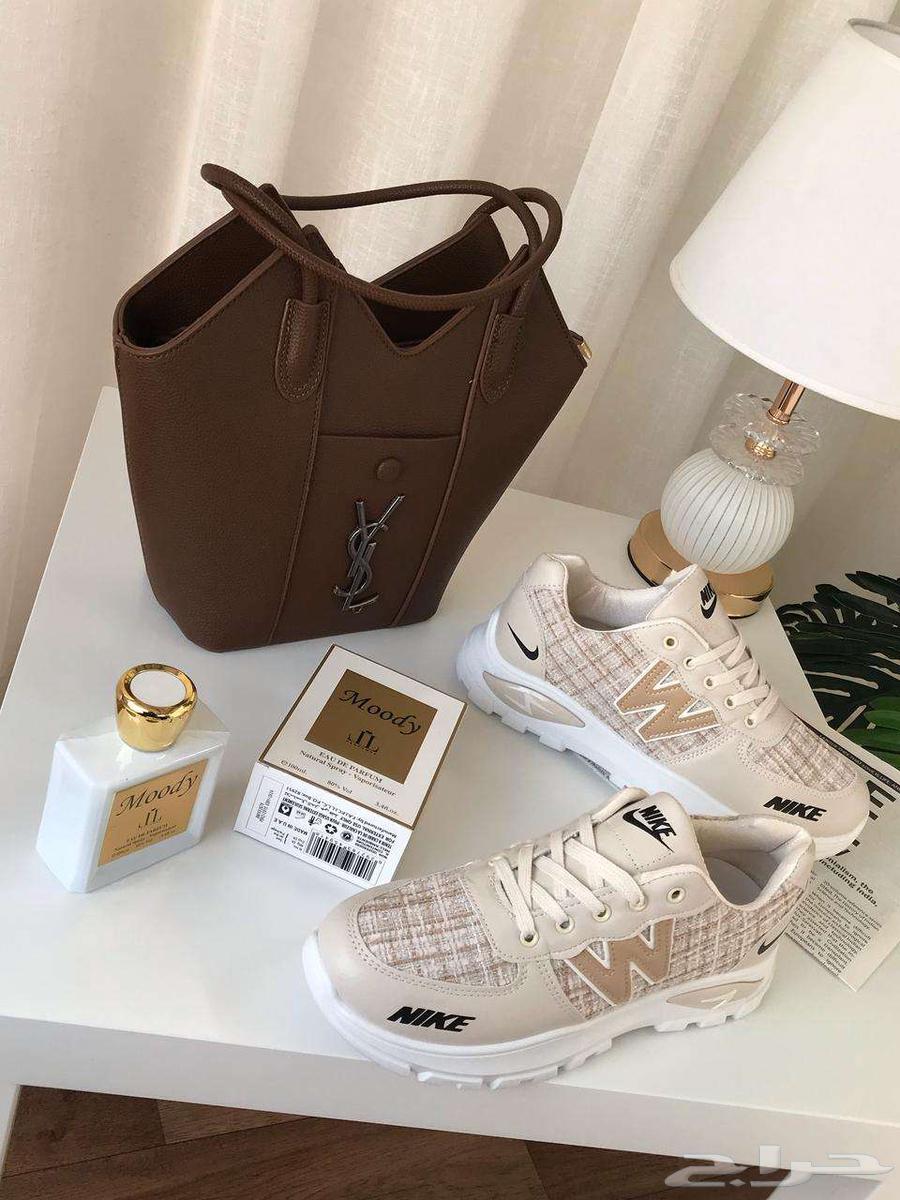 A set of a bag from the brand Cellier with several shoes from the same brand63081461016193111