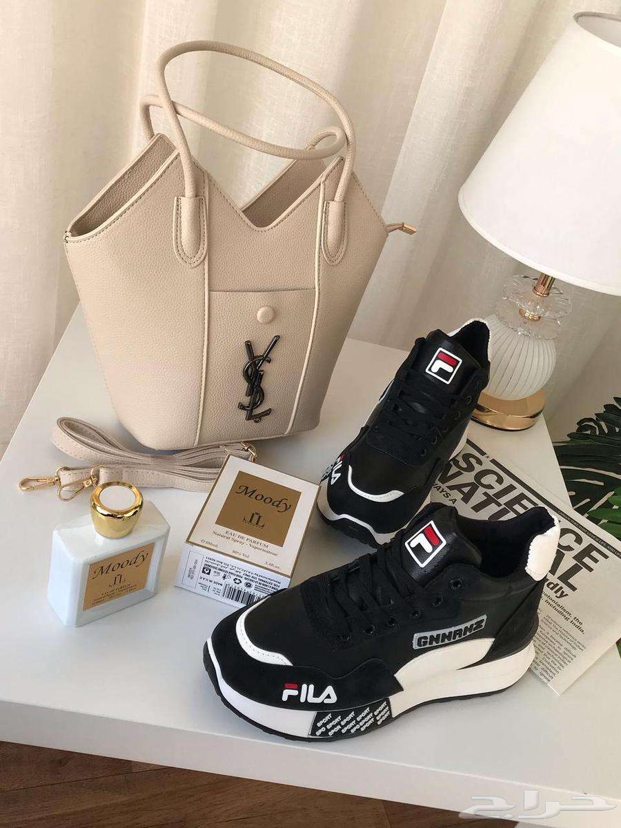 A set of a bag from the brand Cellier with several shoes from the same brand63081461016193112