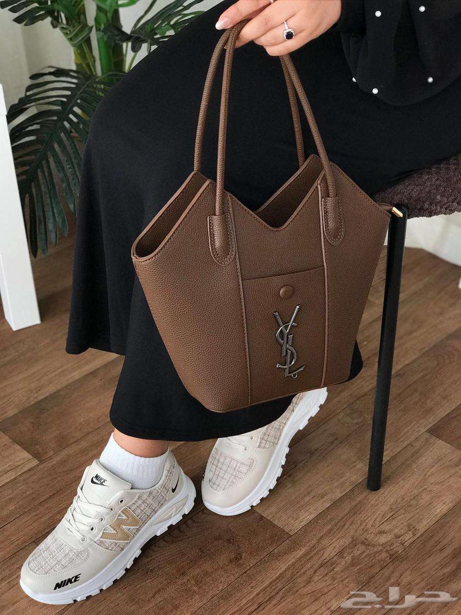 A set of a bag from the brand Cellier with several shoes from the same brand63081461016193114
