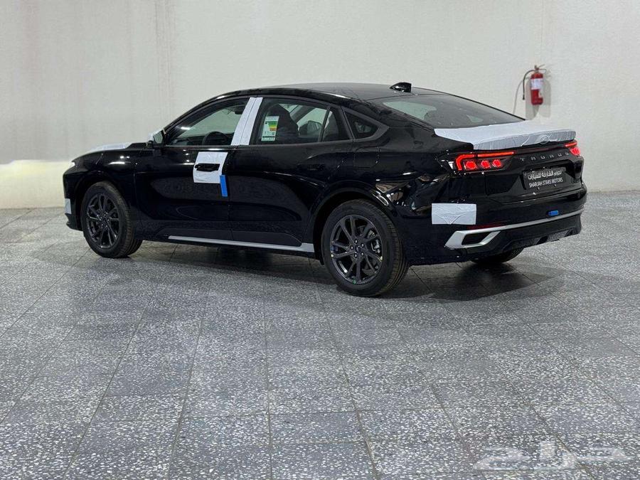 Ford Taurus Ambienti 2025 - Black - Price 11600063119519711235111