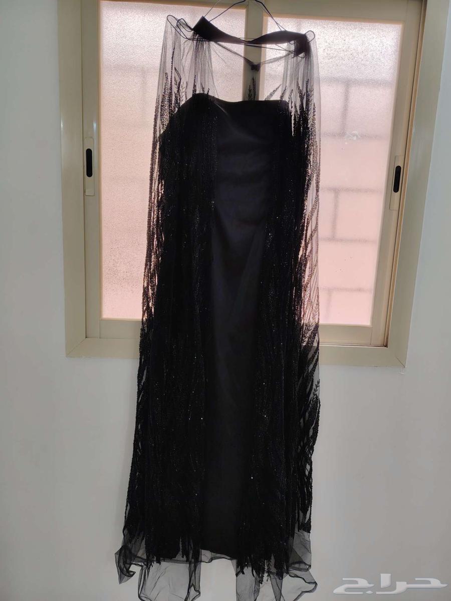 For sale, a large evening dress measuring 63 cm63068030691713113