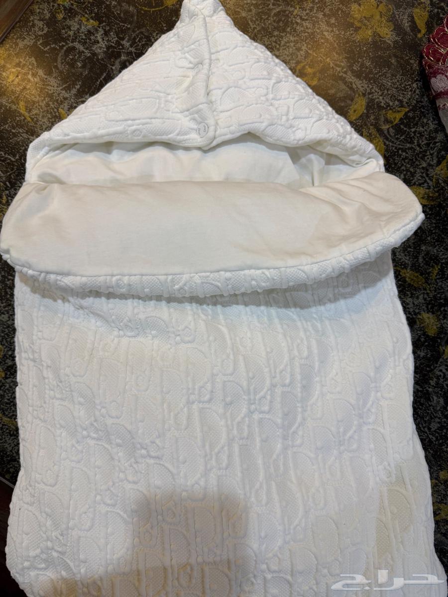 Newborn bed Mads Dior with its clothes63022428497666111
