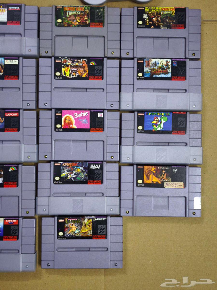 تم البيع- جهاز سوبر نينتندو مع يدين و 23 شريط اصلي snes63331708857987114