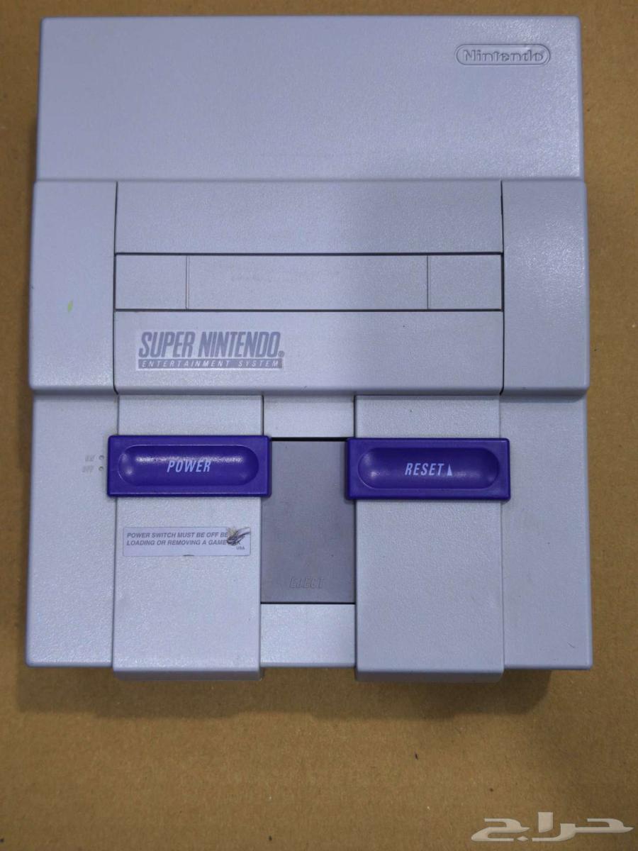 تم البيع- جهاز سوبر نينتندو مع يدين و 23 شريط اصلي snes63331708857987111