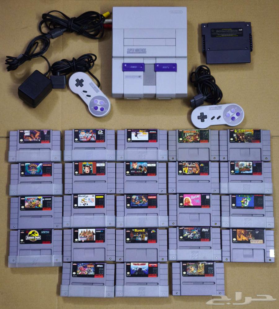تم البيع- جهاز سوبر نينتندو مع يدين و 23 شريط اصلي snes63331708857987110