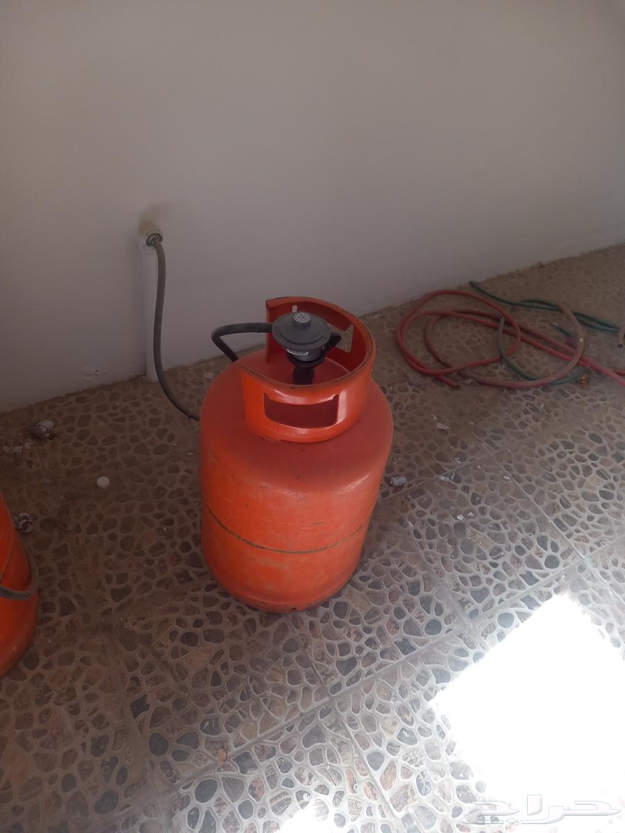 A refrigerator, cupboard, gas, kitchen, and living room for sale at the mine.63438689946881117