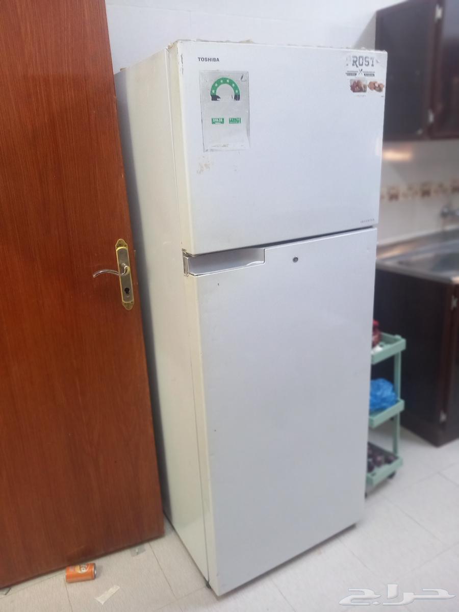 A refrigerator, cupboard, gas, kitchen, and living room for sale at the mine.63438689946881111