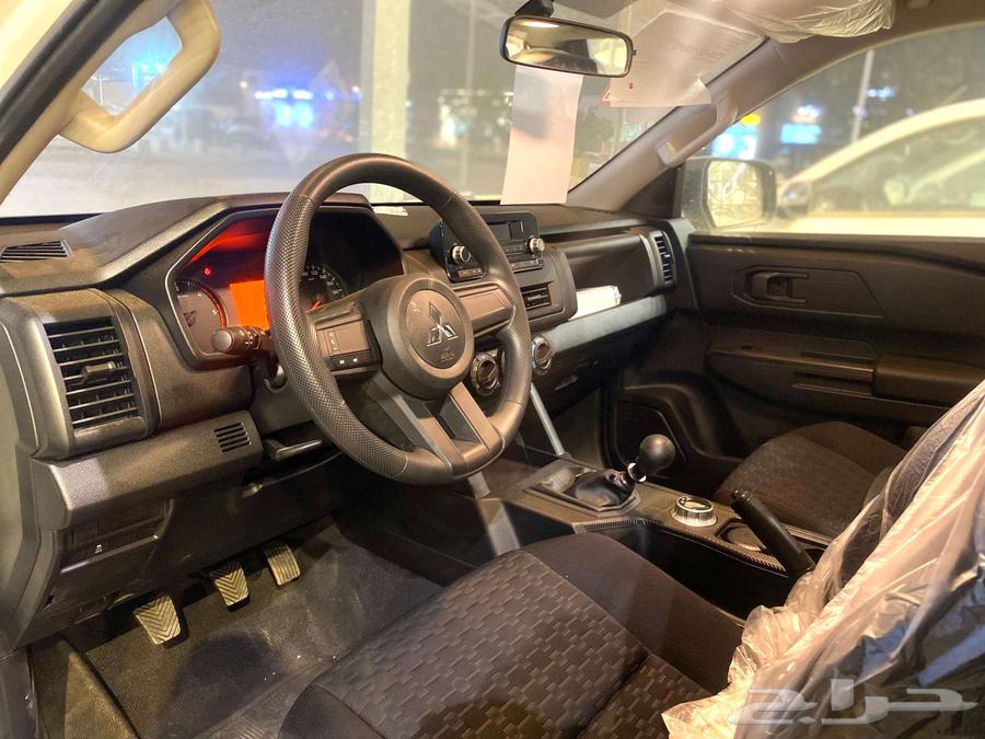 ميتسوبيشي L200 غمارتين ديزل قير عادي دبل 202463387429684354114