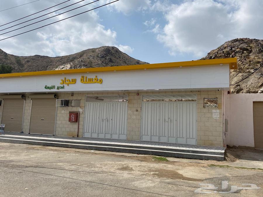 Commercial land for sale in Abha, Al-Murbah neighborhood, with a commercial building on it63611860275330114