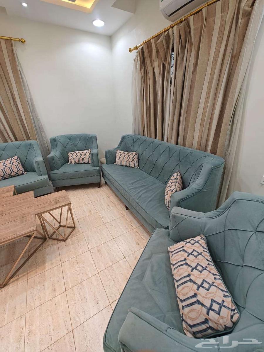 Turquoise sofa with 3 service tables and curtains63712037686018111
