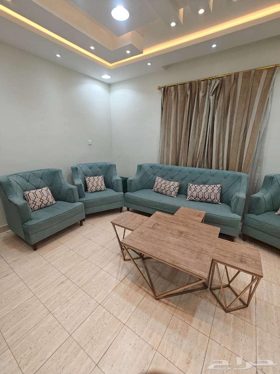 Turquoise sofa with 3 service tables and curtains63712037686018110