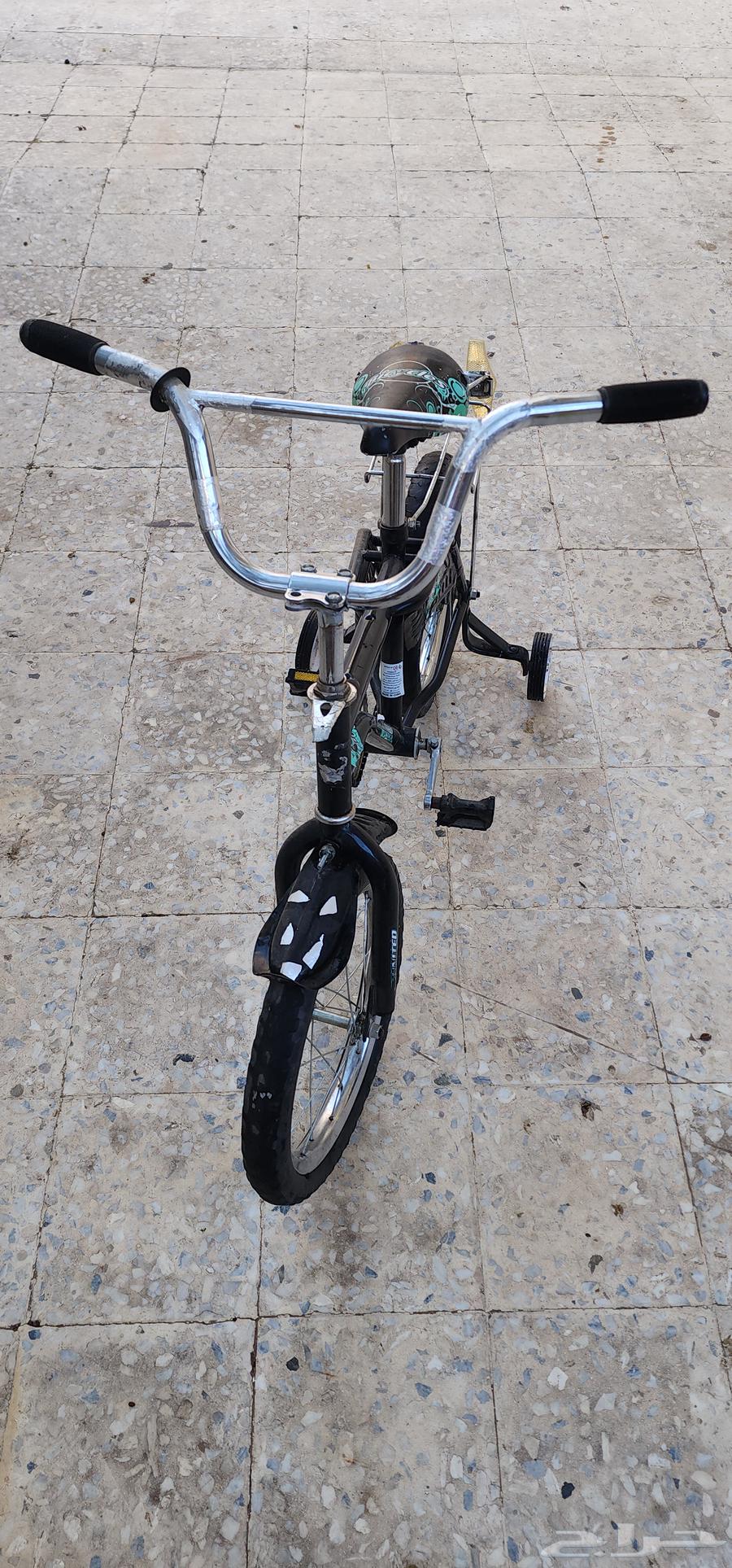 Children's bicycle for sale in good condition with support63714908614017110