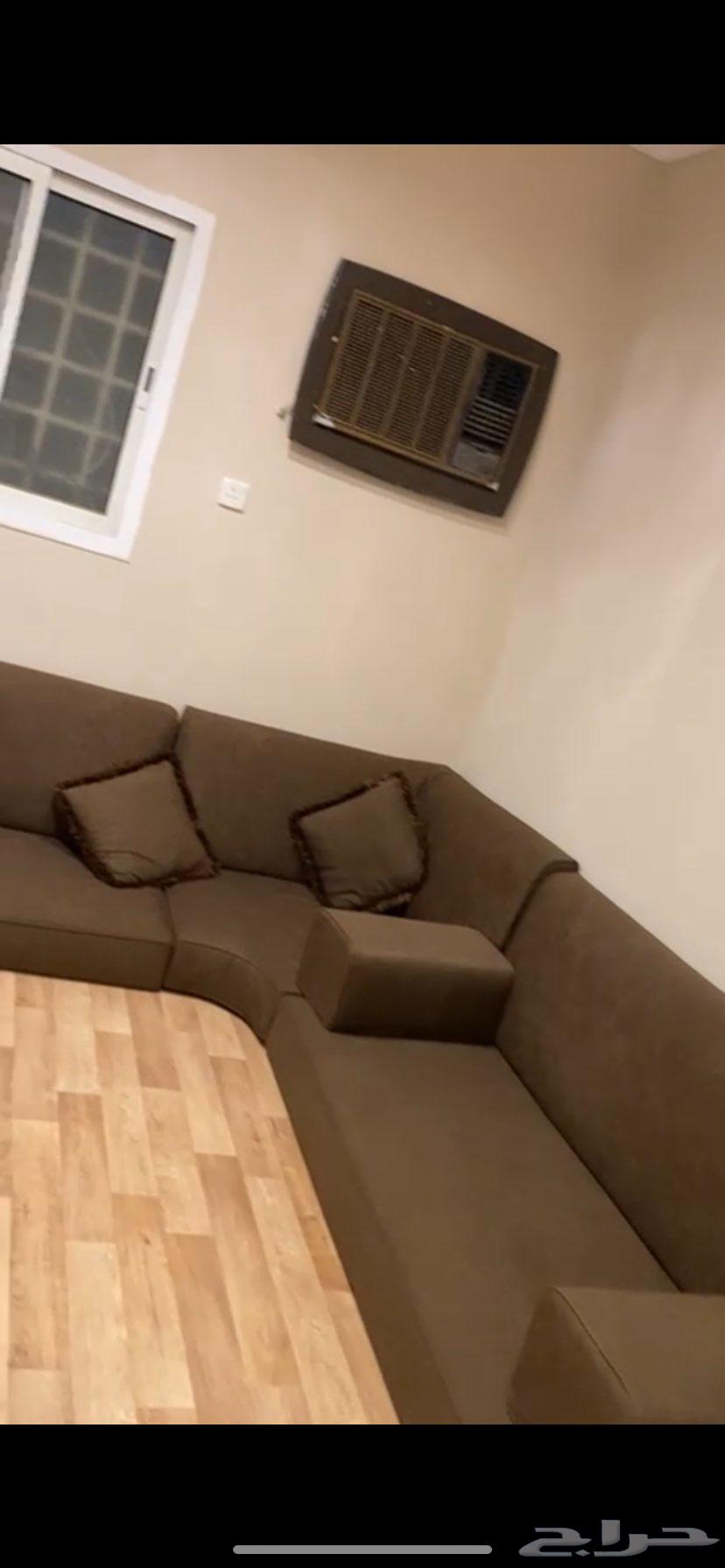 Large used sofa with curtain and large cushion in the same color63725717431169113