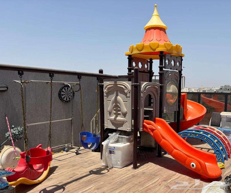 Outdoor children's playground with two swings and two slides 163721688856066111