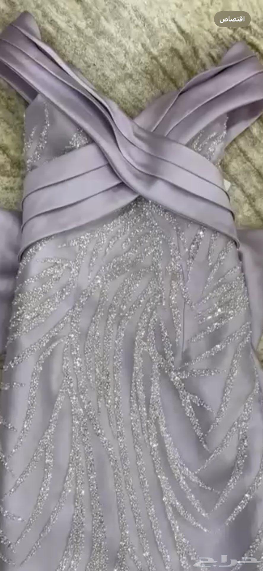 New evening dress, unworn with its tag, size M63752057360643112