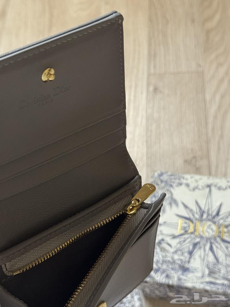 Dior wallet discounted by 350 SAR63799321811201112