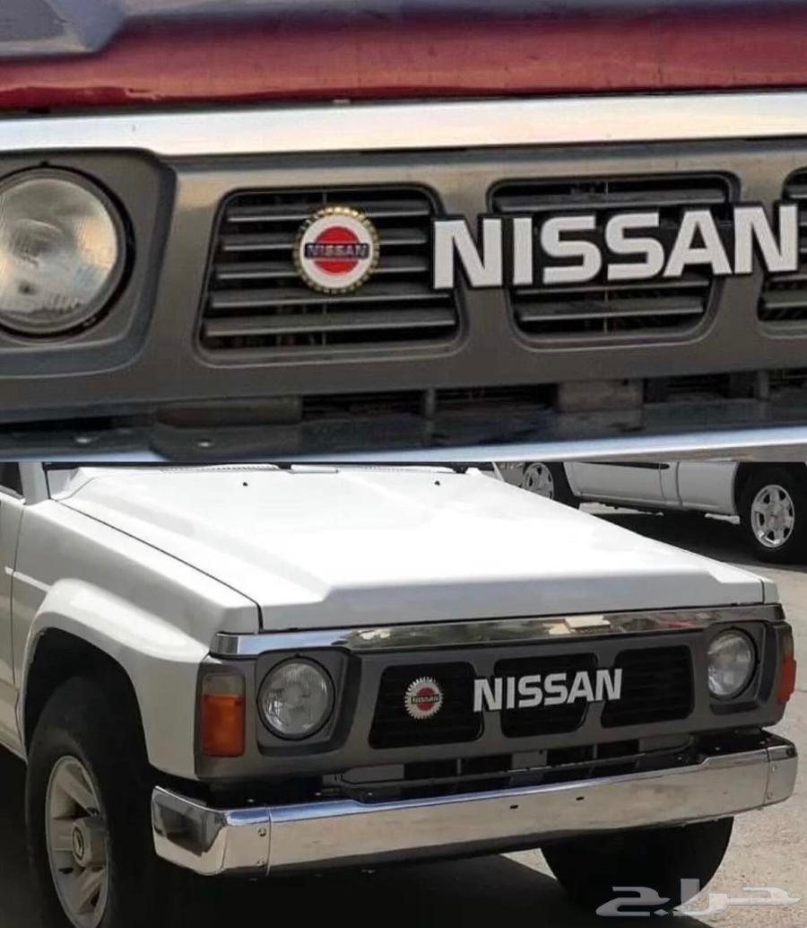 علامة شبك نيسان ذهبي و فضي64346960843138110