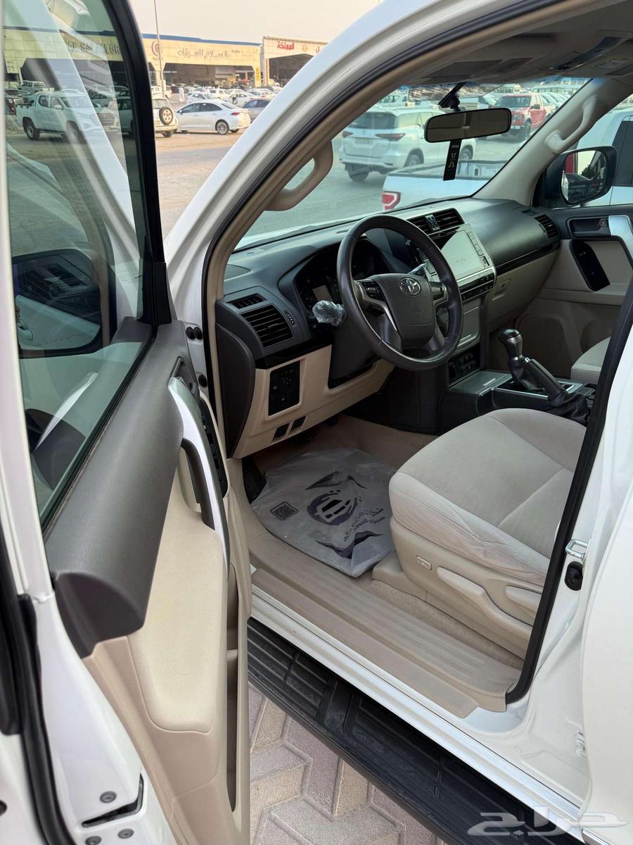 تويوتا برادو نص فل TXL V6 ابيض ممشى 112 الف بنزين 202064348378164227113