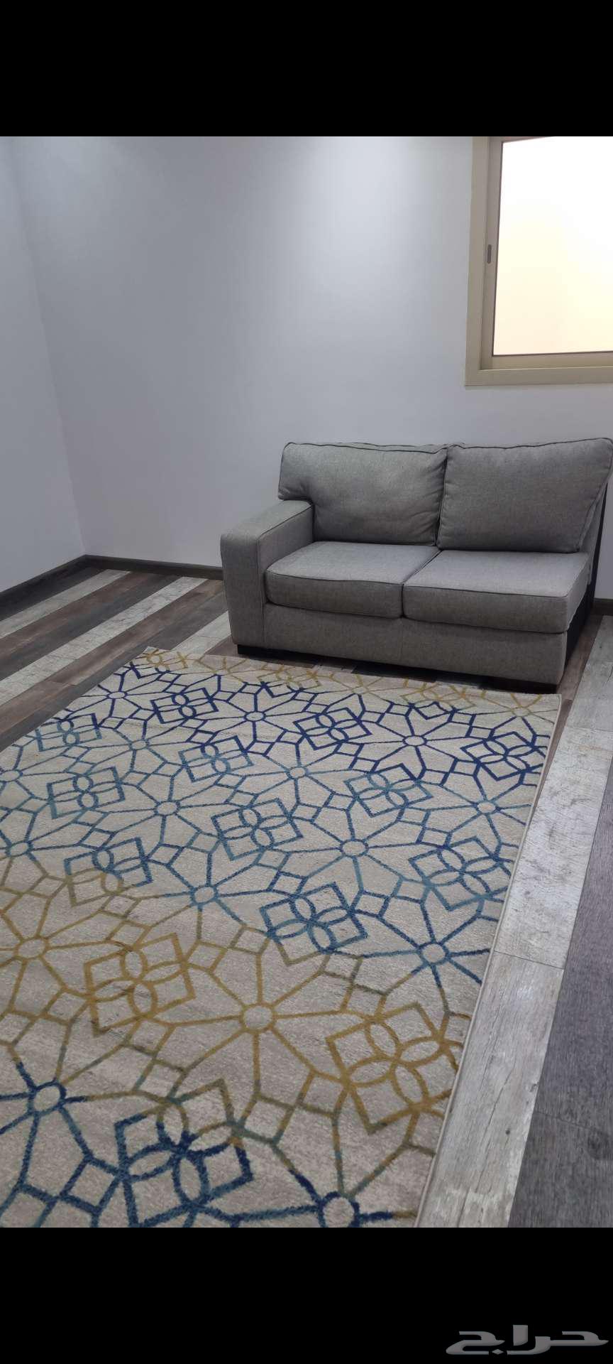 Double sofa with a 2 3 clean used carpet64141549762435110