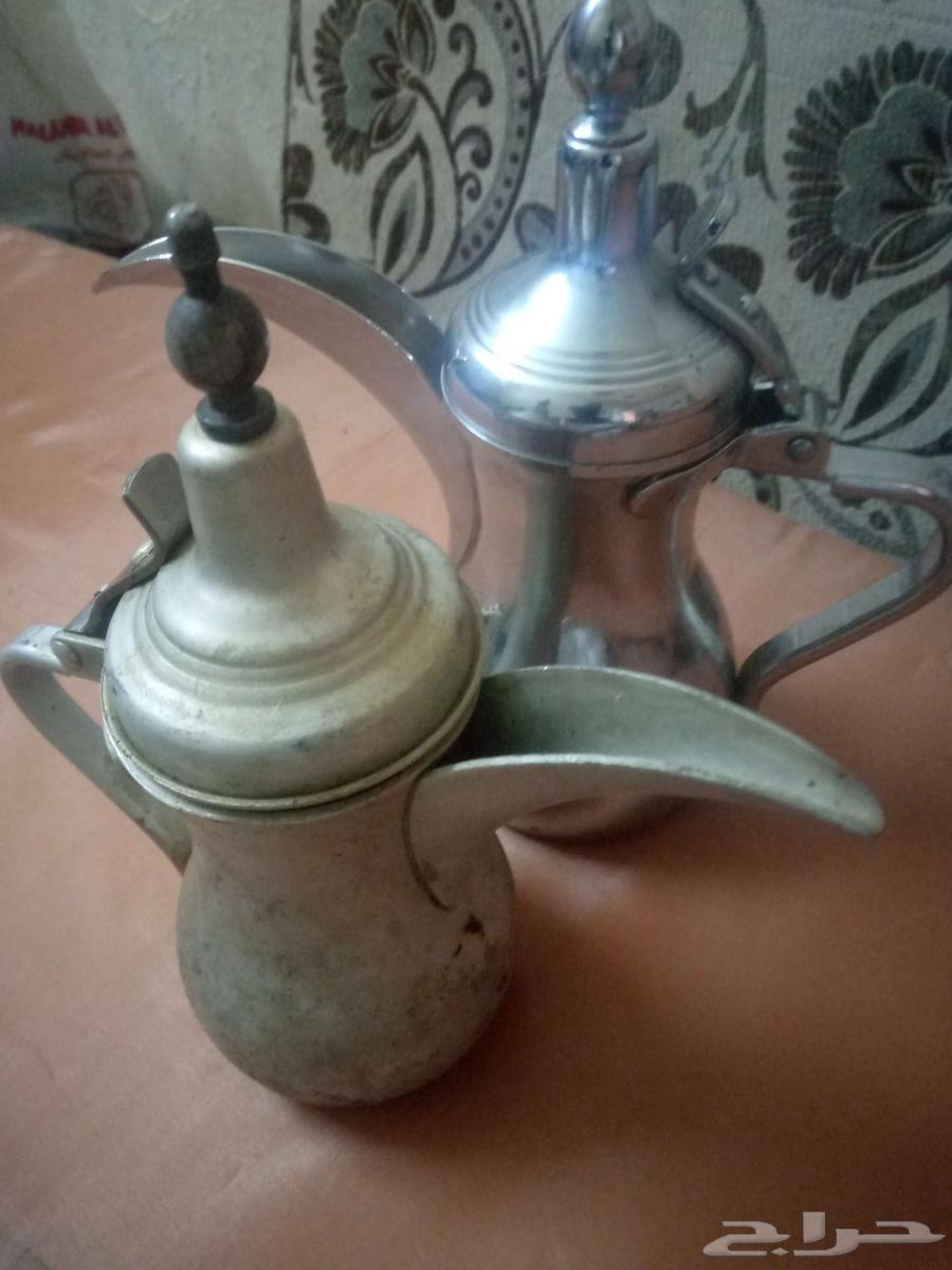 An old Riyal from Al-Senidi with a coffee pot, a sword and a coin from 1392 Hijri64240726217346110