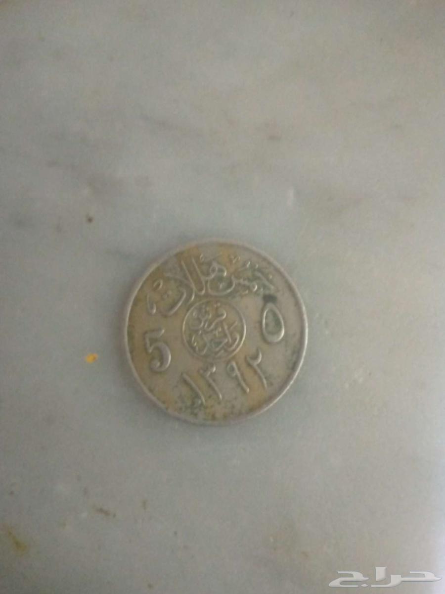 An old Riyal from Al-Senidi with a coffee pot, a sword and a coin from 1392 Hijri64240726217346111