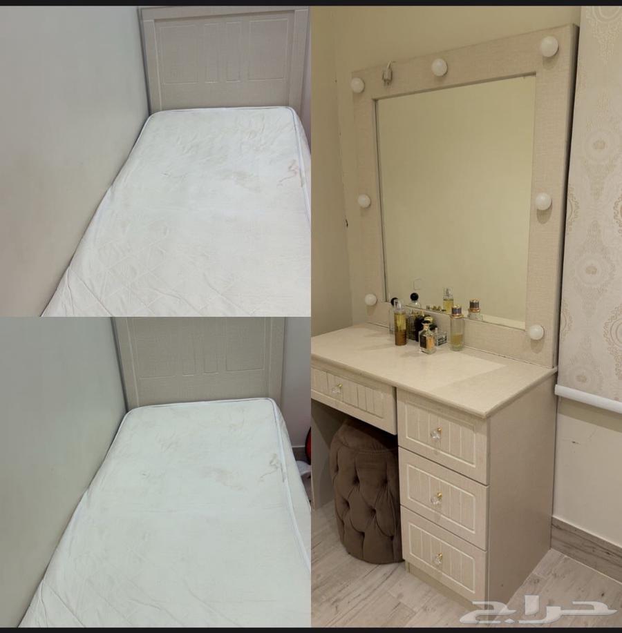 Two single beds with a dressing table that has lighting details64234806994561110