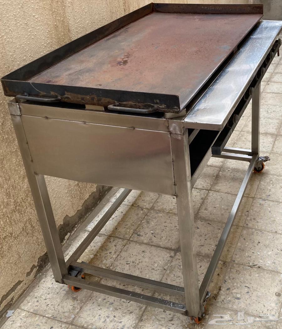 صاج برجر وفطيره.64368397540611110