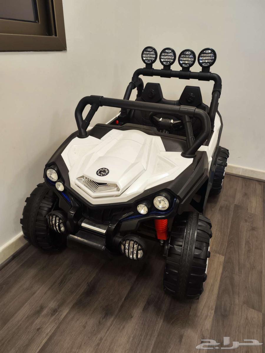 سيارة تسع لطفلين و بها ريموت كنترول64358828928385110