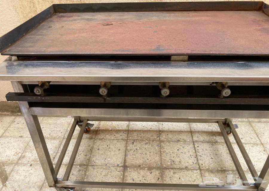 صاج برجر وفطيره.64368397540611112