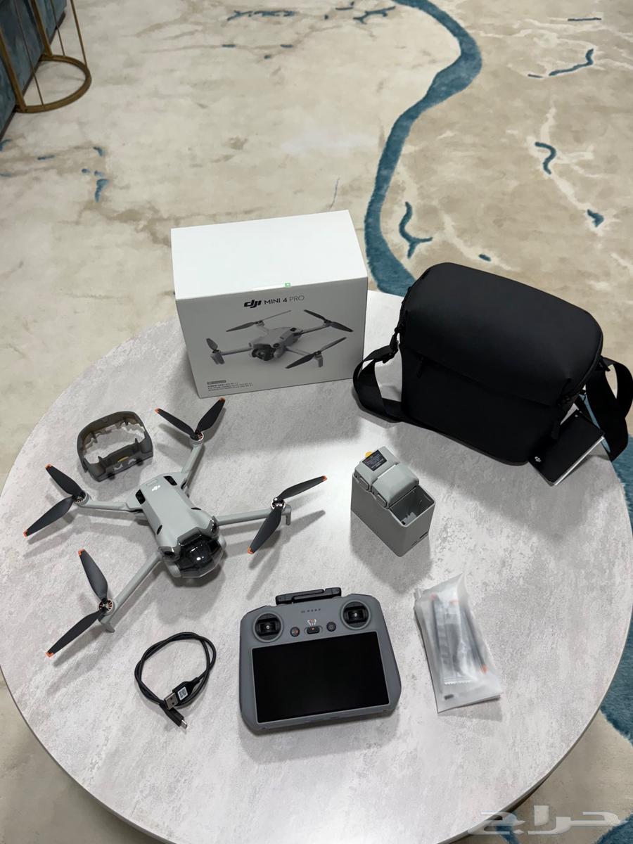 Mini 4 Combo Drone Like Brand New64399884581635110