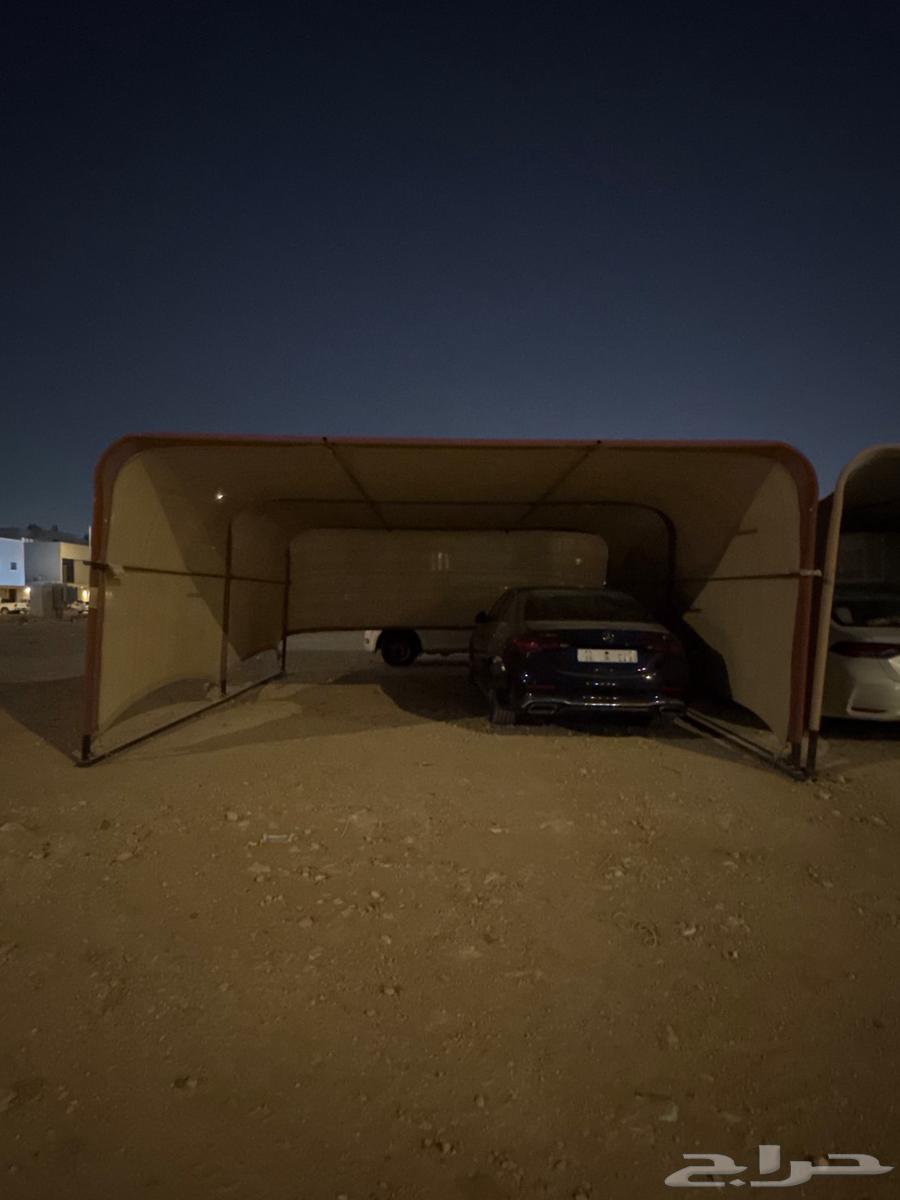 مضلة قماش تكفي سيارتين64411620982658110