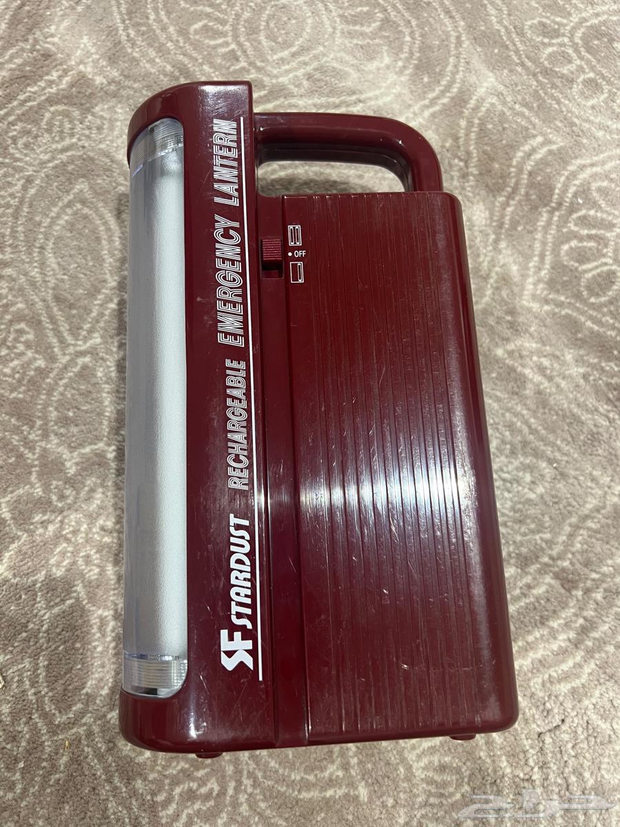 Old flashlight with box and charger64425084252931111