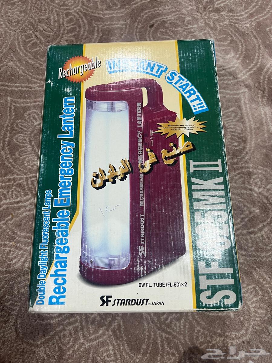 Old flashlight with box and charger64425084252931110