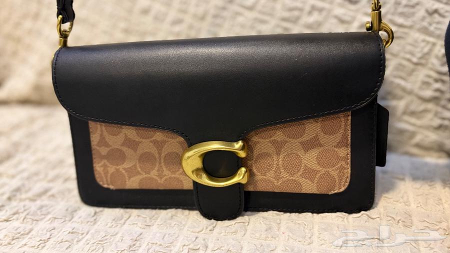 شنطة كوتش اسود وبني64424119196417114