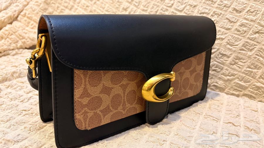 شنطة كوتش اسود وبني64424119196417111