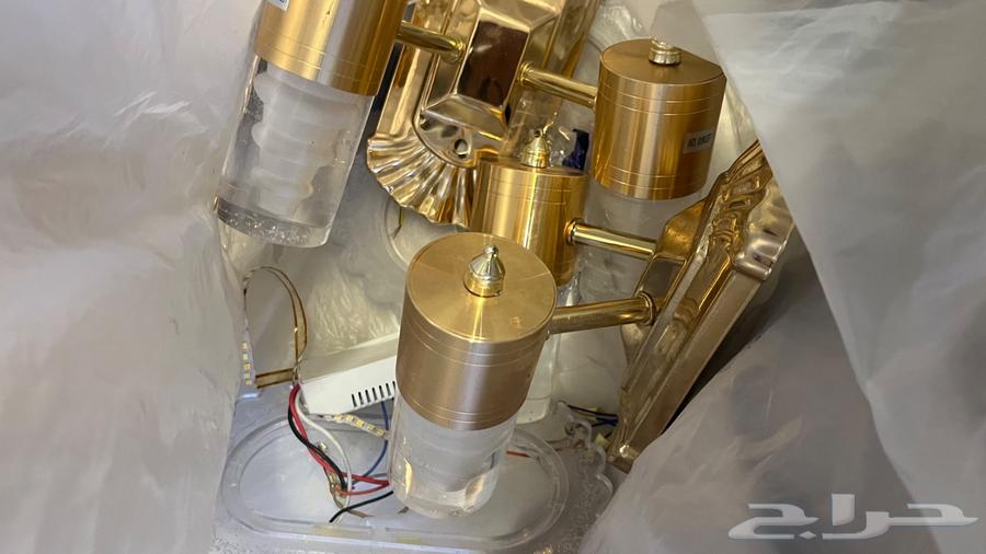 Small chandelier, two and several cushions and backrests sofa64430913856771113