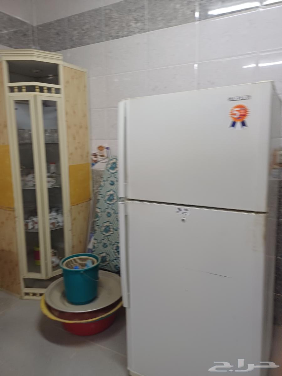 Al-shaped kitchen for sale with its utensils, dishes, refrigerator, freezer, and air conditioners64442816603650110