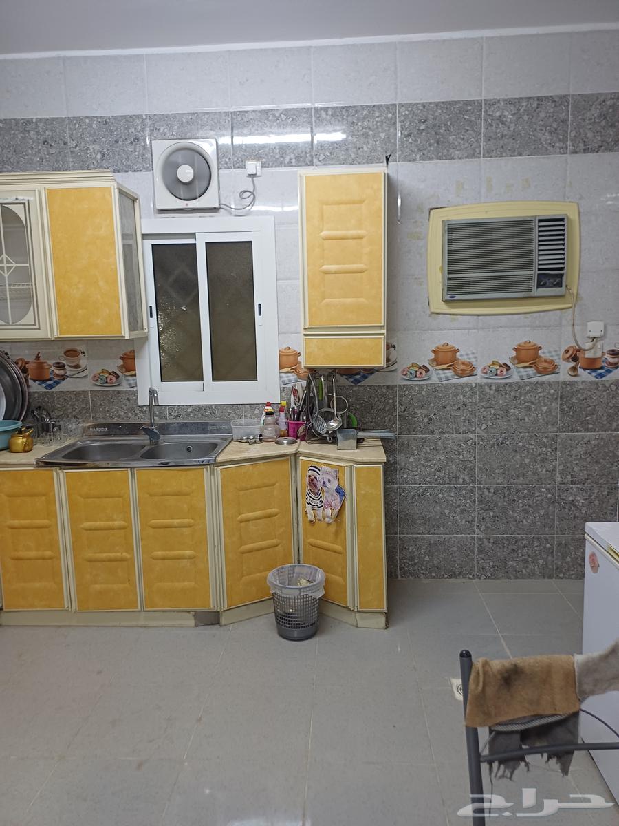 Al-shaped kitchen for sale with its utensils, dishes, refrigerator, freezer, and air conditioners64442816603650114